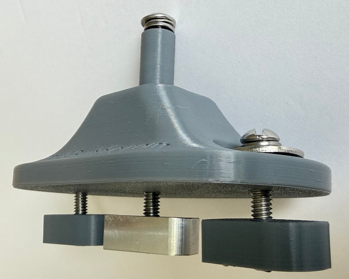 Track Mount Dock Buddie uses a clever cam system to easily lock into most docks that use tracks.
